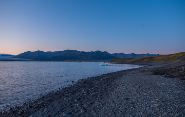 Blue icebergs floating in the jokulsarlon lagoon in Iceland in the september 2019
