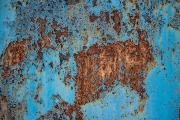 Rusty background. Shabby. Blue background. Rust. Vintage. Interesting texture.
