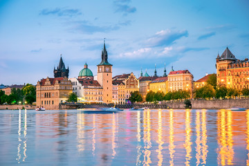 Fototapeta premium Illuminated old town and the Vltava in Prague at night, Czech republic