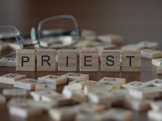 priest the word or concept represented by wooden letter tiles