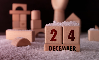 December 24 written with wooden blocks