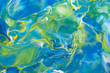 Fototapeta na wymiar Blue and yellow acrylic liquid paint abstract surface
