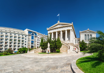 Side panoramic view of the stairs with walking people, National Library in Athens, Greece