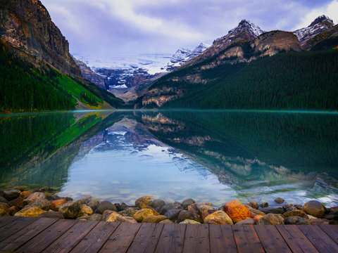 Perfect mountain Lake With Wooden Dock Lake Louise Banff Alberta Canada