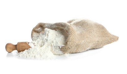Bag with flour on white background