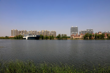 Fototapeta na wymiar Waterfront City Scenery, Tangshan, China