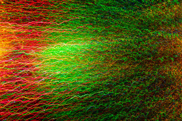 Obraz premium Abstract wavy lines of colorful light warm cast