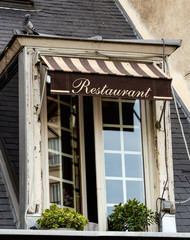 Fototapeta na wymiar French restaurant awning window
