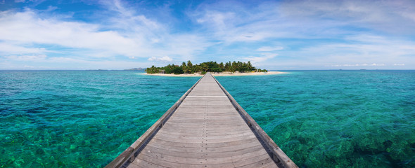 Paradise Island. Panoramic shot of beautiful Mala Mala Island, Fiji, Pacific Ocean. Jetty, pier.