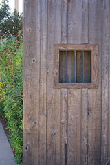 Obraz na płótnie Canvas Wood structure with iron window opening