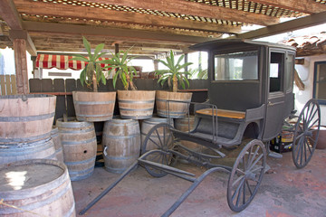Wood barrels and old wood carriage 