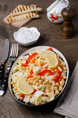 Raw vegetables and chickpeas salad