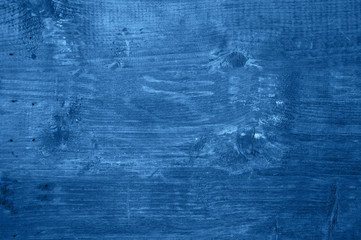Old wooden background in trendy blue color of the year 2020.