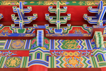 Architectural details of the roof at Tianshui Wushan Water Curtain Caves, Gansu China. OR Temple roof details at the Water Curtain Caves in Wushan , Gansu, China.