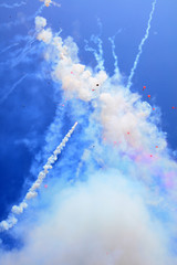 Firecracker smoke in the blue sky