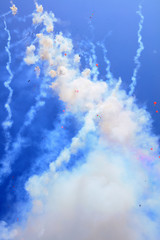 Firecracker smoke in the blue sky