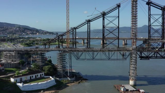 Hercilio Luz Bridge under restoration works connected to Auckland, aerial shot