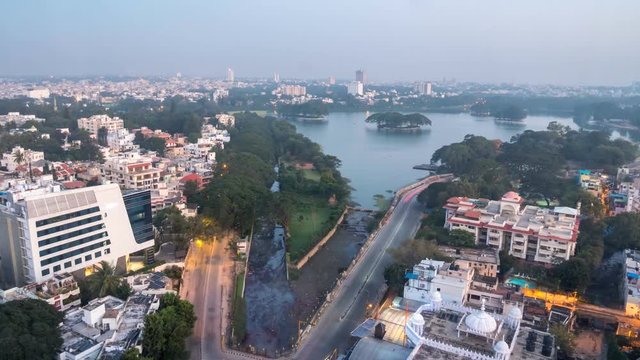 Time Lapse of the Downtown Area of Bangalore at Night Turning into Daytime