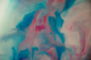 Soft Red, Blue and Purple Dreamscape Abstract Background Soft and beautiful artistic liquid art. Mountains, rivers and oceans of soft colors. Similar to the art style of Georgia O`keeffe. Floating 