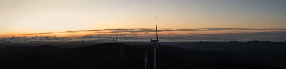 wind turbines in the clouds