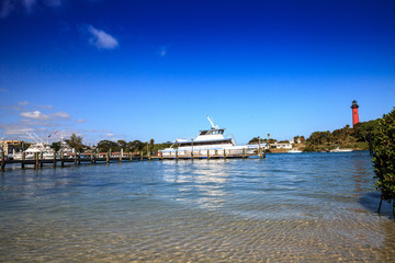 Jupiter Inlet Lighthouse from across the water in Jupiter © SailingAway