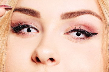 White lenses on a blonde. Eye close-up. Gorgeous eye makeup. How to wear a lens, colored lenses. No...