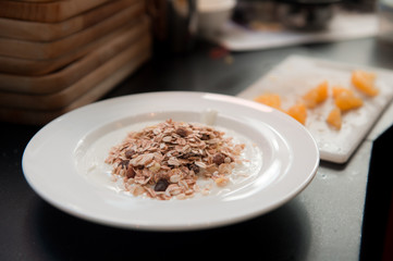 homemade muesli on white dish
