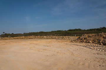 Outdoor construction site yellow sand ground surface space landscape