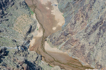 Deep mountain canyon arid river, top view