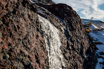 rock covered with ice
