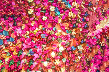 Background textured of fake paper colorful flowers for backdrop.
