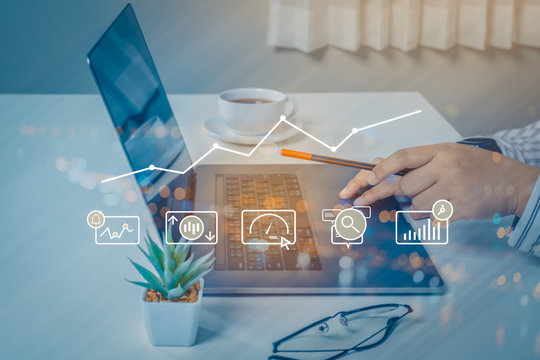 Person using a laptop computer with dIgital marketing technology concept. new startup project online search engine optimisation.