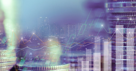 Financial investment concept, Double exposure of city night and stack of coins for finance investor, Forex trading candlestick chart, Cryptocurrency  Digital economy. background for invest
