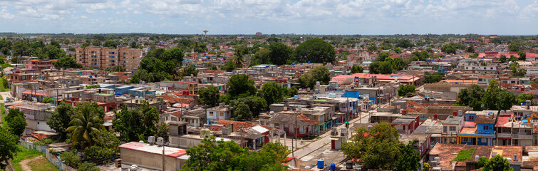 Aerial Panoramic view of a small Cuban Town, Ciego de Avila, during a cloudy and sunny day. Located in Central Cuba.