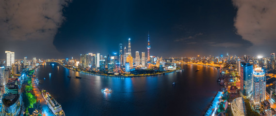 The night view of the city on the huangpu river bank in the center of Shanghai, China