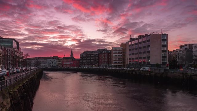 Beautiful sunset timelapse from river lee in cork city center, ireland