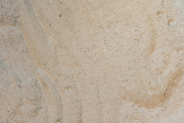 Beach sand texture background closeup