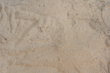Beach sand texture background closeup