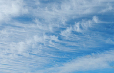 Fototapeta premium Blue sky with white clouds like waves