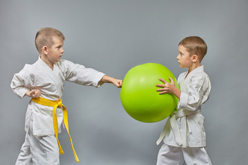 Serious athlete is training to hit the green ball