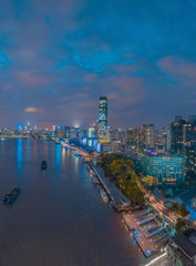 Fototapeta na wymiar The night view of the city on the huangpu river bank in the center of Shanghai, China