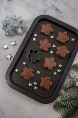 Home made sweet german chocolate christmas cookies on a festive table 