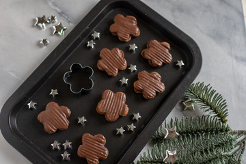 Home made sweet german chocolate christmas cookies on a festive table 