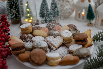 Fototapeta na wymiar Home made sweet german chocolate christmas cookies on a festive table 