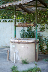 old chain well in summer