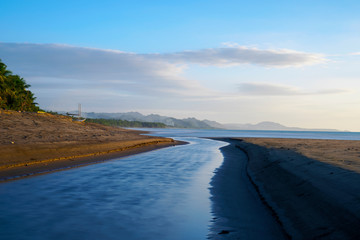 River flowing into ocean, long exposure