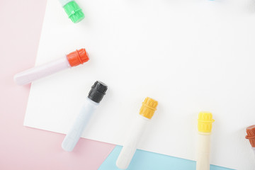 water colour tubes on a drawing art paper