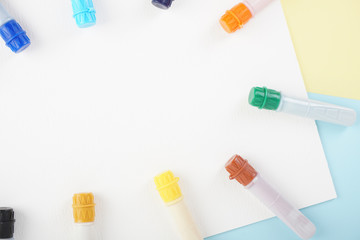 water colour tubes on a drawing art paper