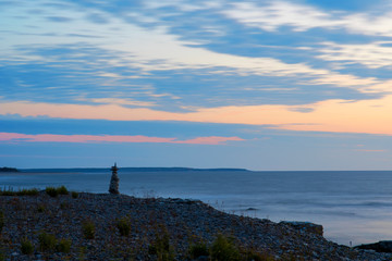 Fototapeta na wymiar Long Exposure Over Coastal Landscape During Vibrant Colored Twilight On The Island Of Gotland, Sweden