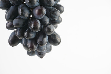 Fresh grape fruits plated over the white background